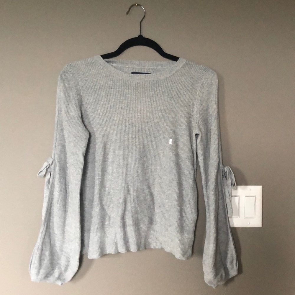 Open armed sweater